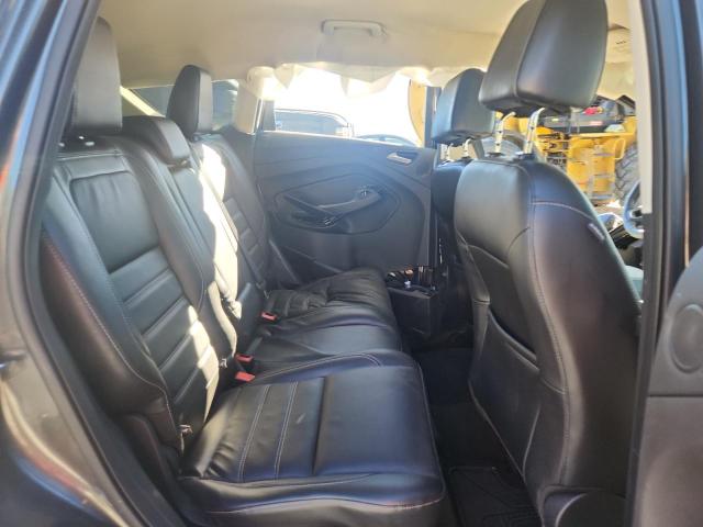 Photo 11 from auction – 2017 FORD ESCAPE TIT with VIN 1FMCU9J97HUC73844