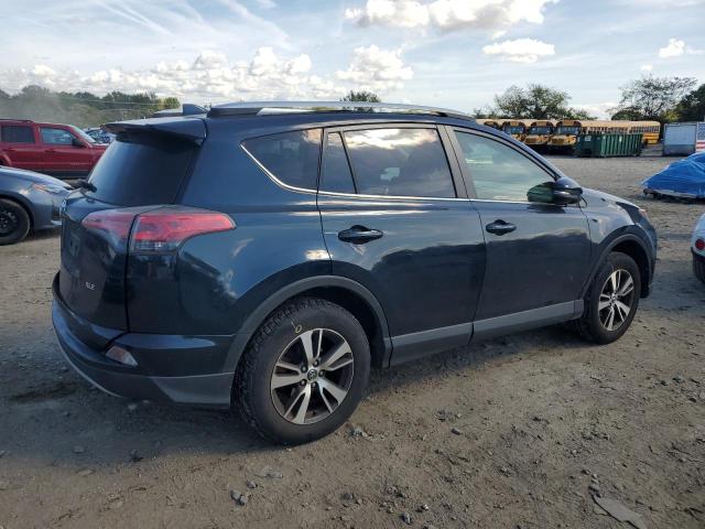 Photo 3 from auction – 2017 TOYOTA RAV4 XLE with VIN JTMWFREV8HD098250