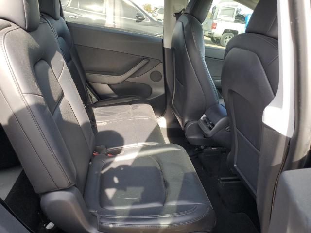 Photo 11 from auction – 2021 TESLA MODEL Y with VIN 5YJYGAEE3MF158977