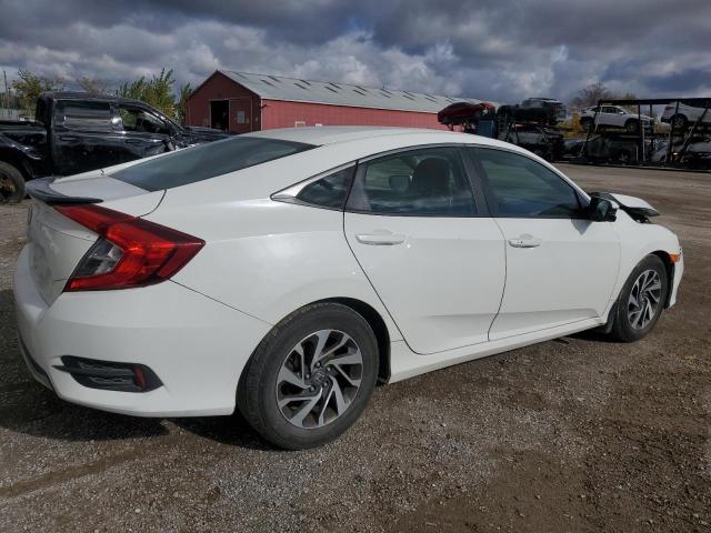 Photo 3 from auction – 2019 HONDA CIVIC EX with VIN 2HGFC2F72KH042896