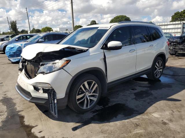 HONDA PILOT ELIT 2017 z numerem VIN 5FNYF6H02HB021888 - Zdjęcie z aukcji