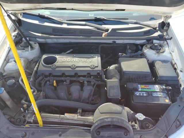 Photo 11 from auction – 2009 KIA OPTIMA LX with VIN KNAGE228595338070