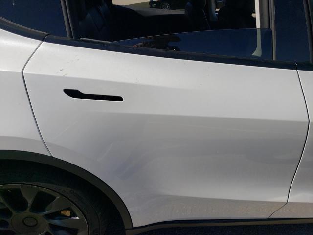 Photo 10 from auction – 2023 TESLA MODEL Y with VIN 7SAYGAEE9PF634799