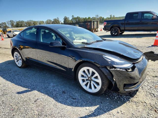 Photo 4 from auction – 2023 TESLA MODEL 3 with VIN 5YJ3E1EB7PF699072