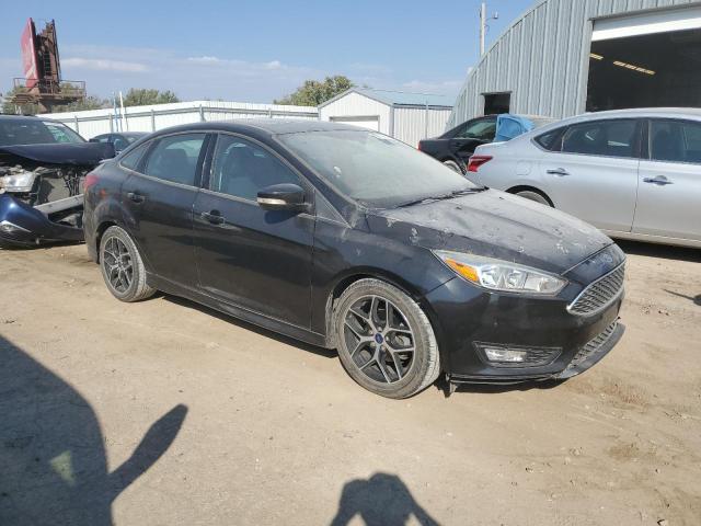 Photo 4 from auction – 2015 FORD FOCUS SE with VIN 1FADP3F27FL314488