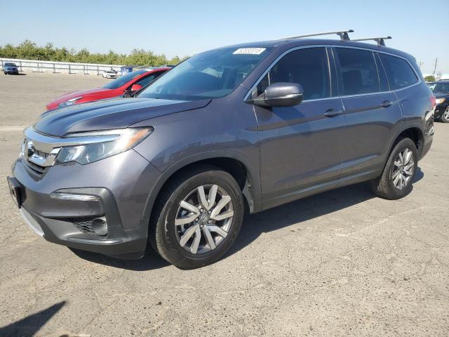 HONDA PILOT EXL 2021 with VIN 5FNYF5H58MB007560 - Photo from auction