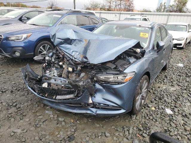 MAZDA 6 2018 with VIN JM1GL1VM0J1313360 - Photo from auction