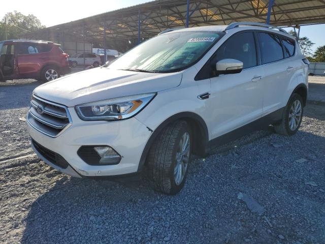 FORD ESCAPE TITANIUM 2017 with VIN 1FMCU0J98HUF11129 - Photo from auction