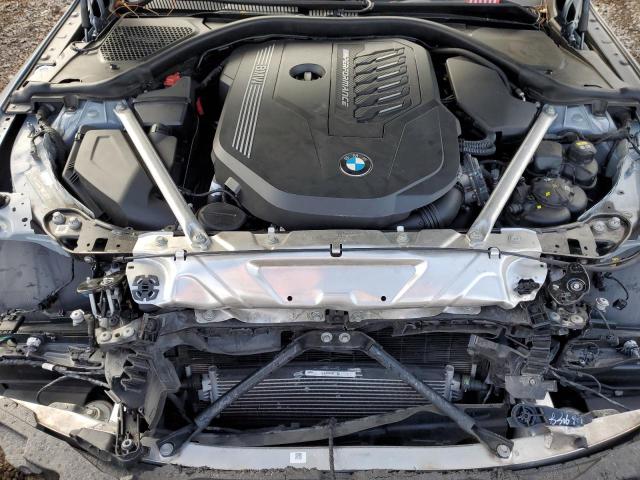 Photo 11 from auction – 2022 BMW M440I with VIN WBA53AT08NCJ10750
