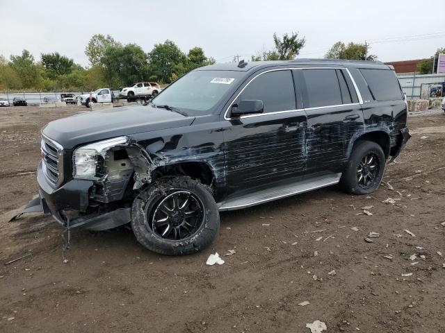 GMC YUKON 2015 with VIN 1GKS2AKC5FR174784 - Photo from auction