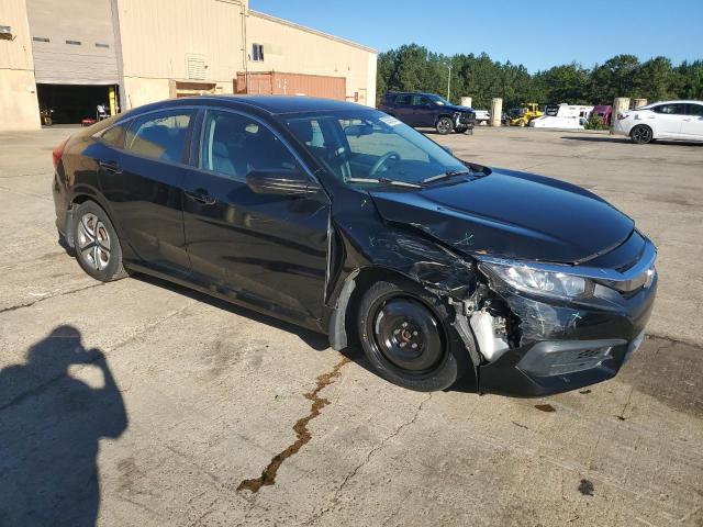Photo 4 from auction – 2016 HONDA CIVIC LX with VIN 19XFC2F54GE038204
