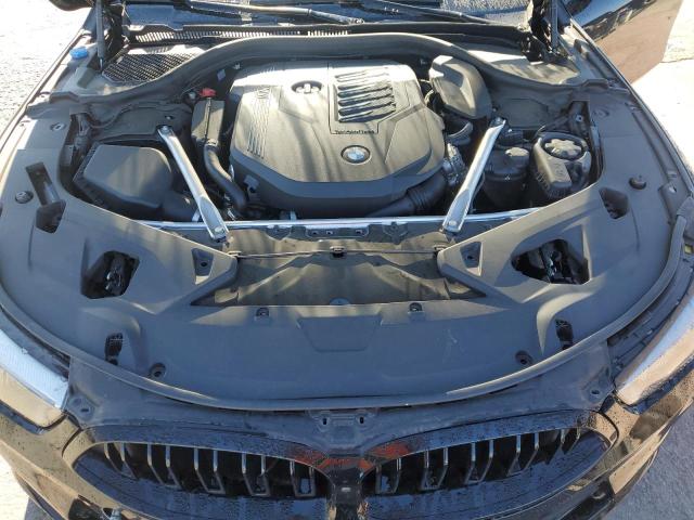 Photo 11 from auction – 2024 BMW 840I with VIN WBAGV2C07RCN06456