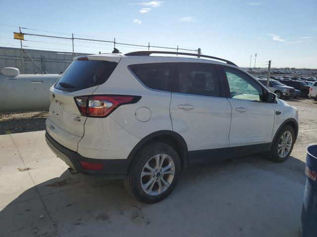 Photo 3 from auction – 2018 FORD ESCAPE SE with VIN 1FMCU9GD8JUA71810
