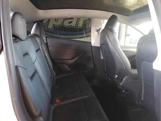 Photo 10 from auction – 2023 TESLA MODEL Y with VIN 7SAYGDEE0PF674920