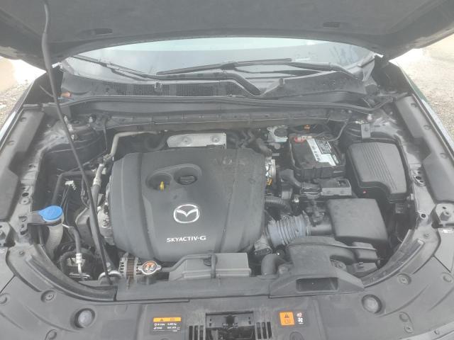 Photo 12 from auction – 2021 MAZDA CX-5 TOURI with VIN JM3KFACM6M0441950