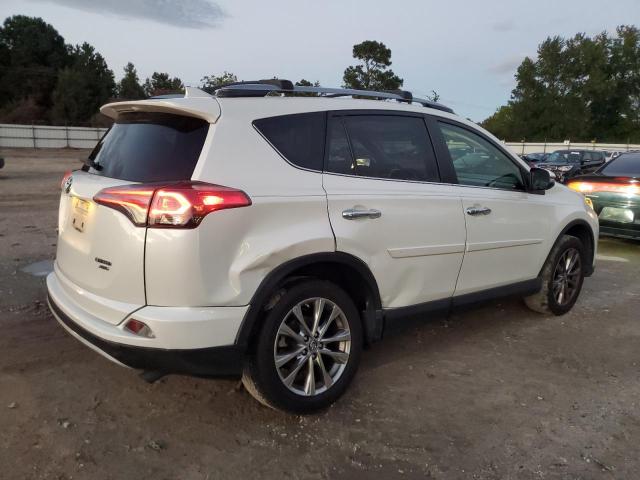 Photo 3 from auction – 2018 TOYOTA RAV4 LIMIT with VIN JTMDFREV0JD242435