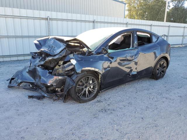 TESLA MODEL Y 2024 with VIN 7SAYGDED8RA330260 - Photo from auction