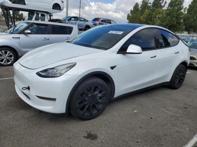 TESLA MODEL Y 2022 with VIN 7SAYGDEE1NA020440 - Photo from auction