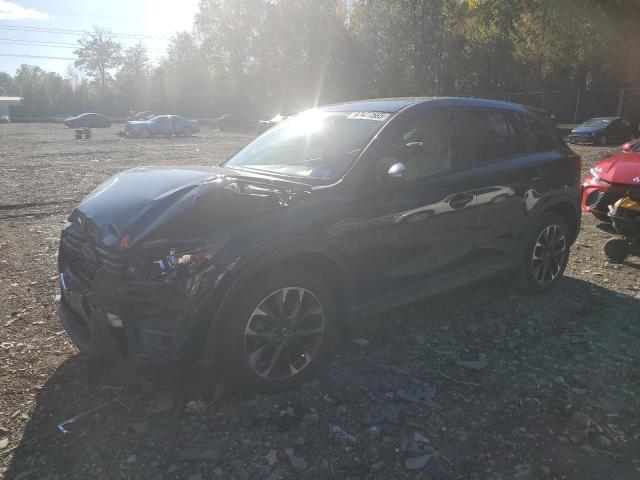 MAZDA CX-5 GT 2016 with VIN JM3KE4DY8G0889200 - Photo from auction