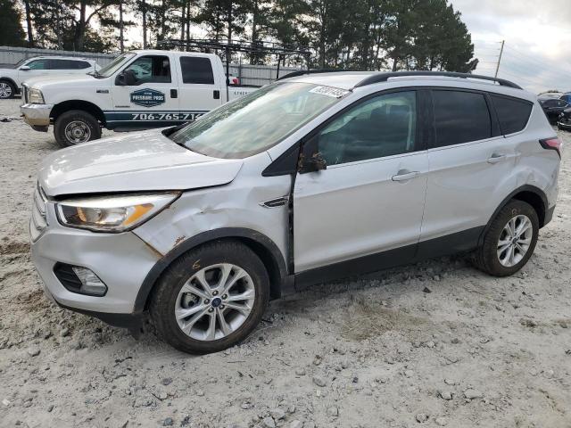 FORD ESCAPE SE 2018 with VIN 1FMCU9GD9JUA27475 - Photo from auction