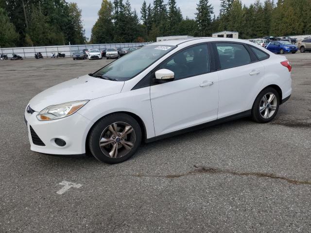 FORD FOCUS SE 2014 with VIN 1FADP3F27EL230945 - Photo from auction