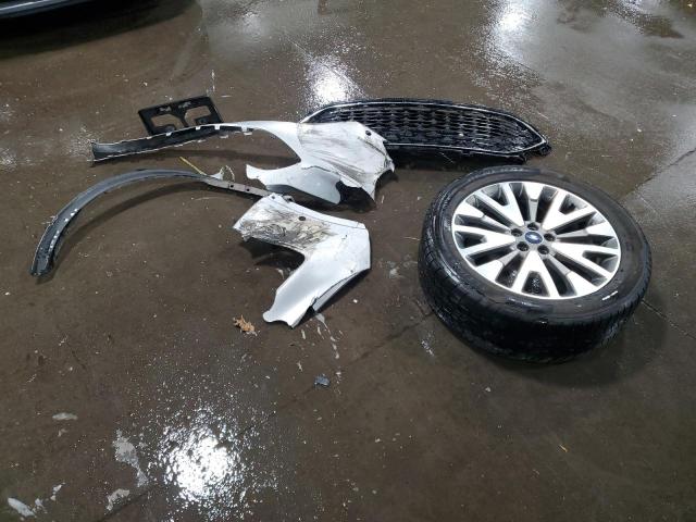 Photo 13 from auction – 2020 FORD ESCAPE TIT with VIN 1FMCU9DZ0LUB94231