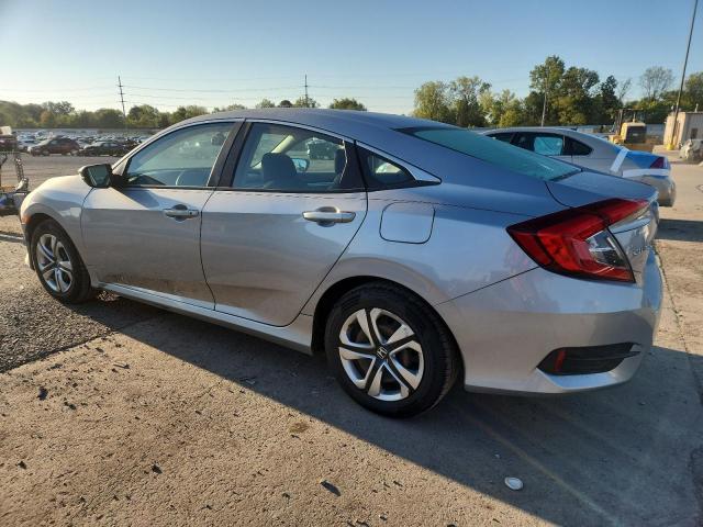 Photo 2 from auction – 2016 HONDA CIVIC LX with VIN 19XFC2F58GE026069