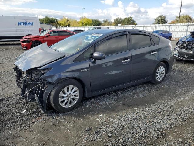 TOYOTA PRIUS PLUG 2014 with VIN JTDKN3DPXE3059274 - Photo from auction