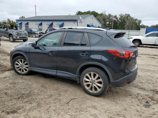 Photo 2 from auction – 2014 MAZDA CX-5 GT with VIN JM3KE2DY8E0334684