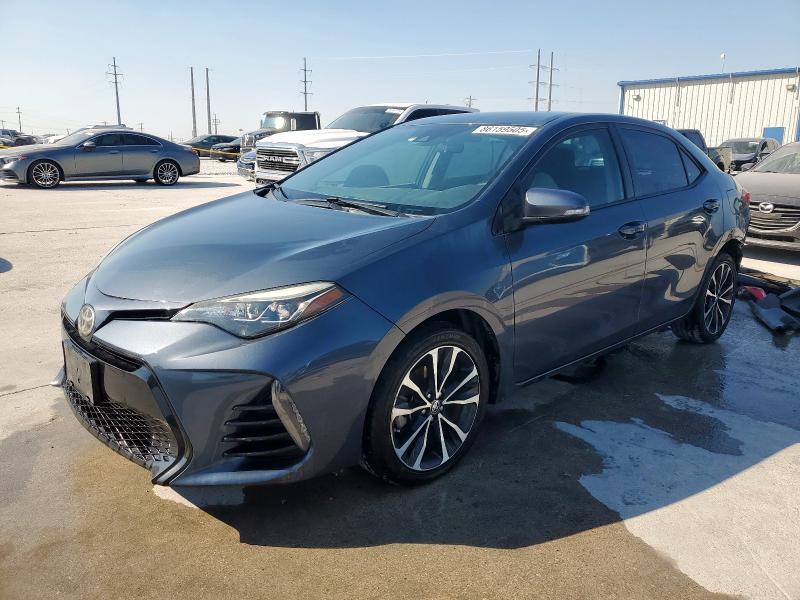 TOYOTA COROLLA L 2017 with VIN 5YFBURHE3HP596093 - Photo from auction
