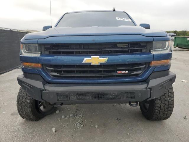 Photo 5 from auction – 2018 CHEVROLET SILVERADO with VIN 3GCUKREC5JG217656