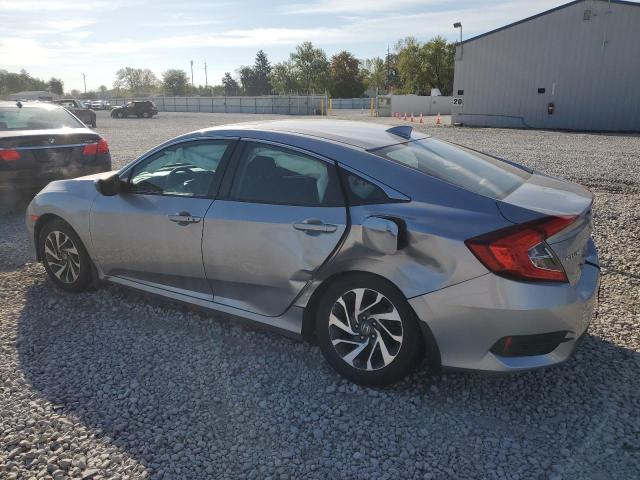 Photo 2 from auction – 2017 HONDA CIVIC EX with VIN 19XFC2F77HE036871