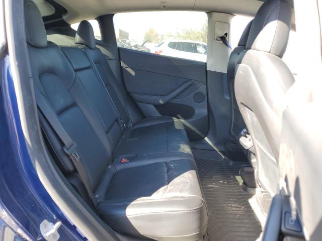 Photo 11 from auction – 2022 TESLA MODEL Y with VIN 7SAYGDEEXNF545449