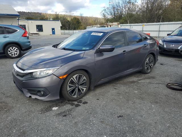 HONDA CIVIC EX 2017 with VIN 2HGFC1F36HH638691 - Photo from auction