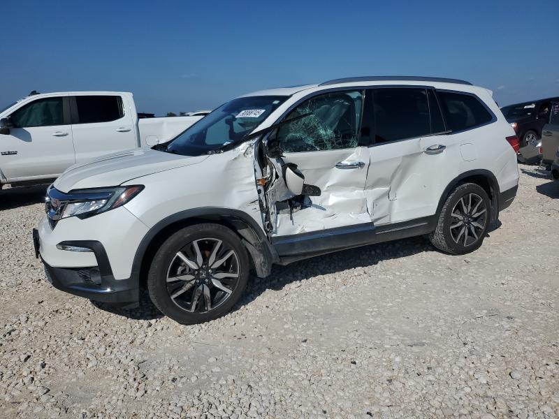 Photo 1 from auction – 2022 HONDA PILOT TOUR with VIN 5FNYF5H63NB004043