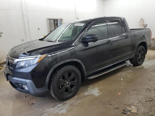 HONDA RIDGELINE 2019 with VIN 5FPYK3F8XKB038987 - Photo from auction