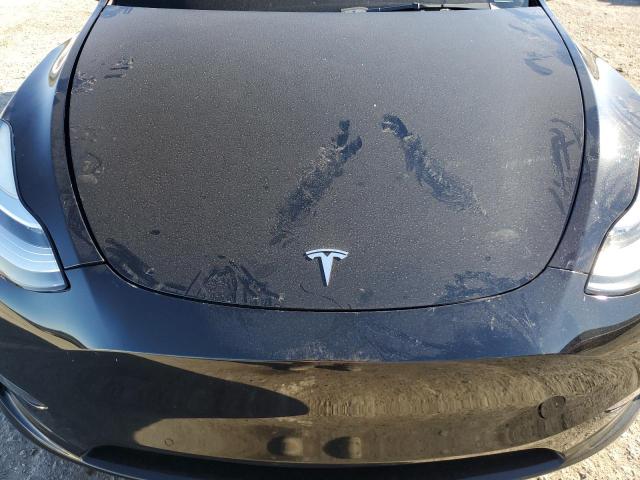 Photo 11 from auction – 2021 TESLA MODEL Y with VIN 5YJYGDED9MF106035