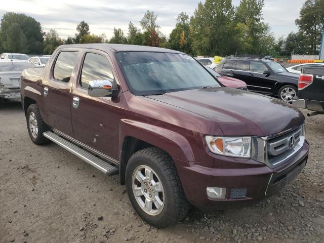 Photo 4 from auction – 2010 HONDA RIDGELINE with VIN 5FPYK1F47AB013822