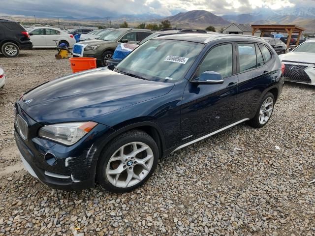 BMW X1 XDRIVE2 2014 with VIN WBAVL1C50EVY20595 - Photo from auction