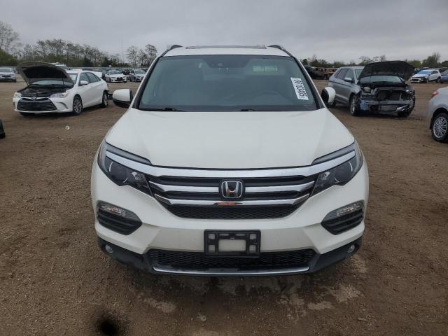 Photo 5 from auction – 2018 HONDA PILOT ELIT with VIN 5FNYF6H02JB014140