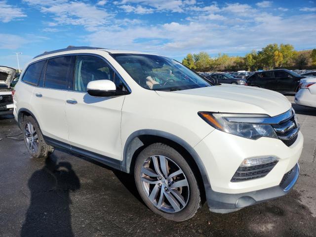 Photo 4 from auction – 2017 HONDA PILOT ELIT with VIN 5FNYF6H03HB062904