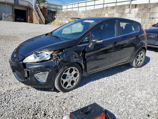 FORD FIESTA SES 2011 with VIN 3FADP4FJ5BM202696 - Photo from auction