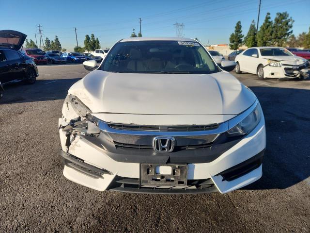 Photo 5 from auction – 2018 HONDA CIVIC LX with VIN 2HGFC2F50JH512274