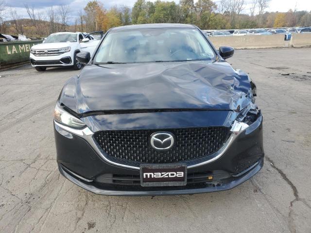 Photo 5 from auction – 2018 MAZDA 3 GRAND TO with VIN JM1GL1VM5J1311071
