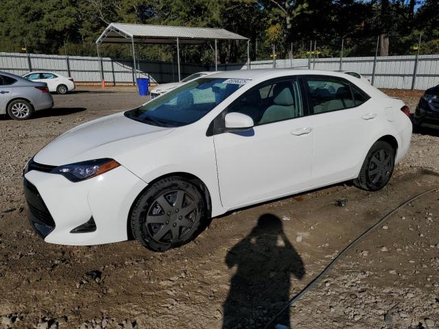 TOYOTA COROLLA L 2017 with VIN 5YFBURHE6HP654102 - Photo from auction