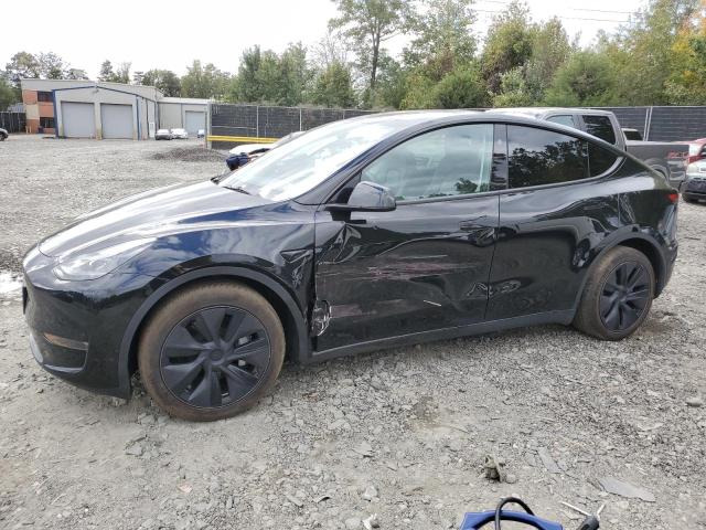 TESLA MODEL Y 2025 with VIN 7SAYGAEE7SF253946 - Photo from auction