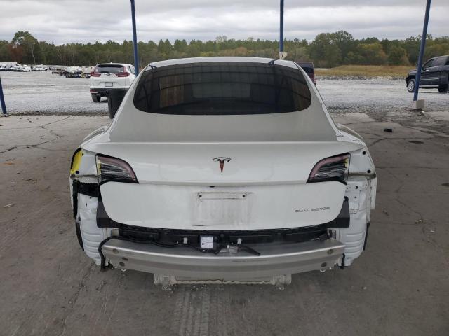 Photo 6 from auction – 2022 TESLA MODEL 3 with VIN 5YJ3E1EB9NF107457