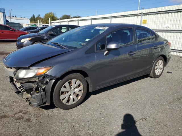 HONDA CIVIC LX 2012 with VIN 2HGFB2F57CH317410 - Photo from auction
