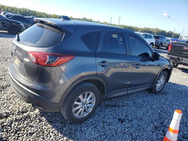 Photo 3 from auction – 2015 MAZDA CX-5 TOURI with VIN JM3KE2CY8F0440037