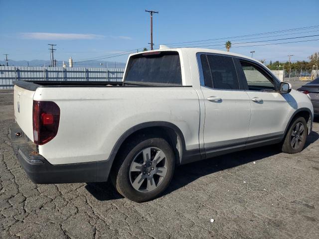 Photo 3 from auction – 2017 HONDA RIDGELINE with VIN 5FPYK2F50HB008082